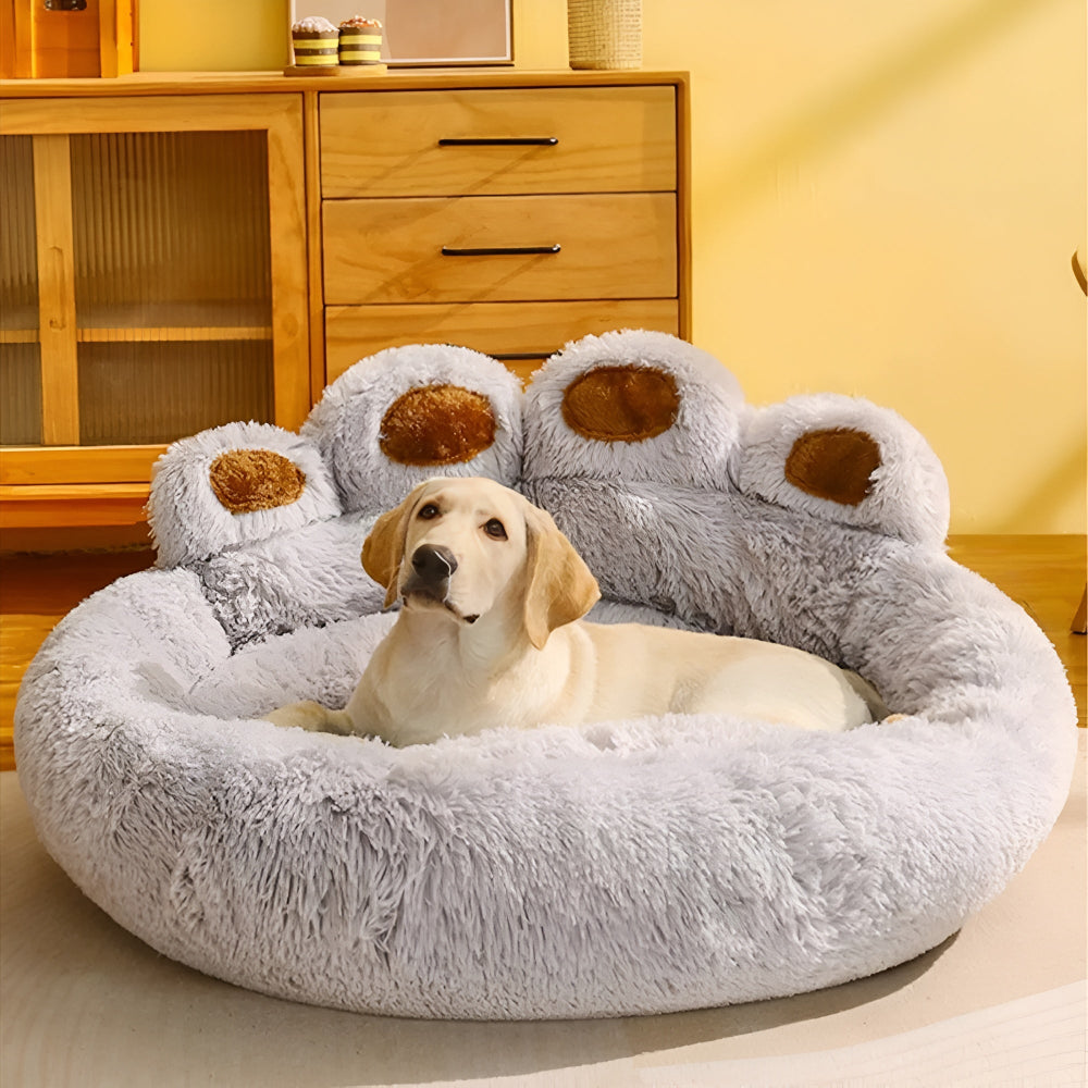 Cama para mascotas peluda en forma de pata