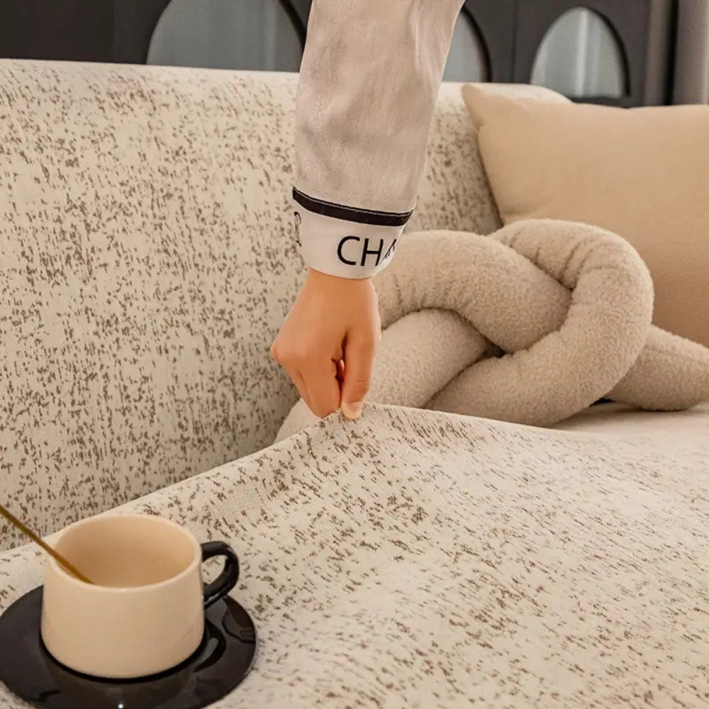 Funda de sofá de chenilla con patrón moteado
