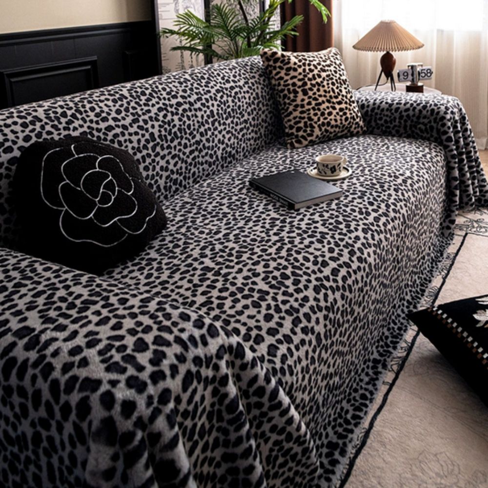 Funda de sofá acogedora con estampado de leopardo