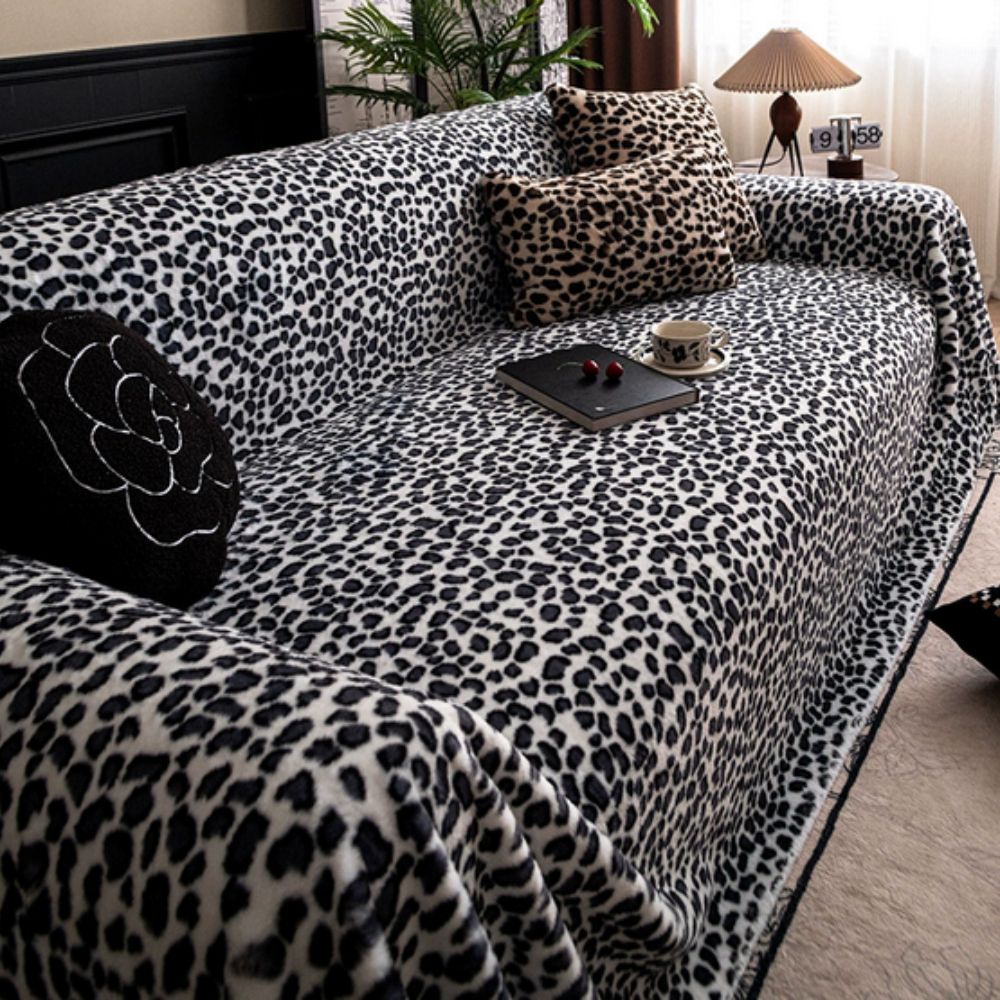 Funda de sofá acogedora con estampado de leopardo