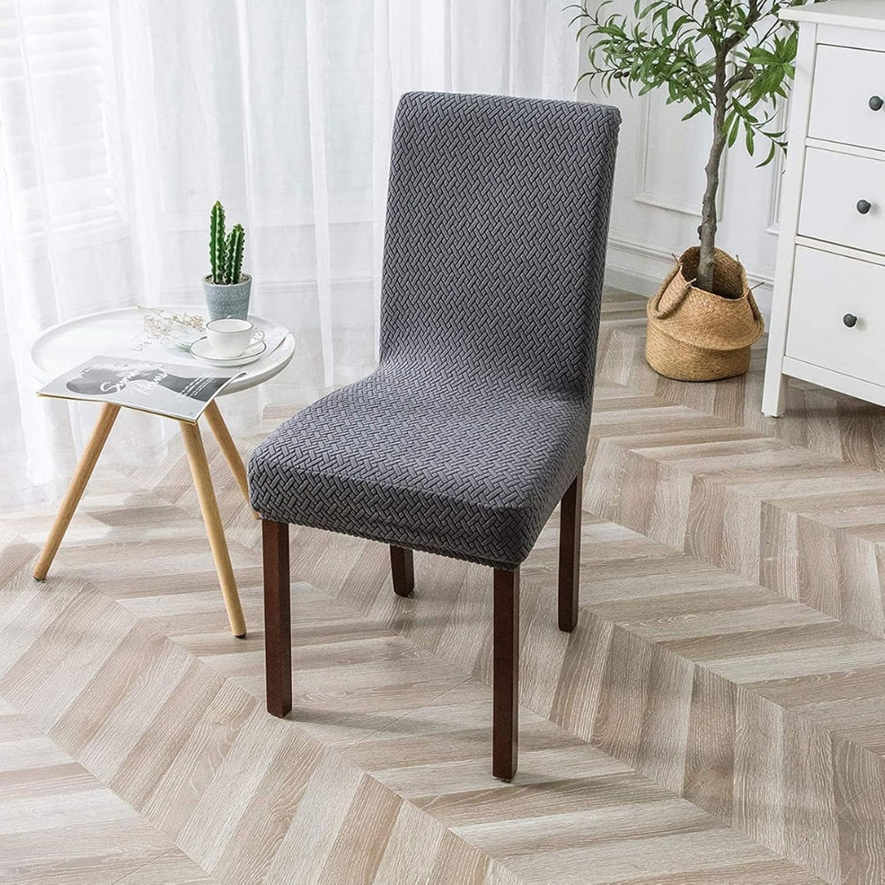 Funda elástica de terciopelo jacquard Sylva para silla de comedor