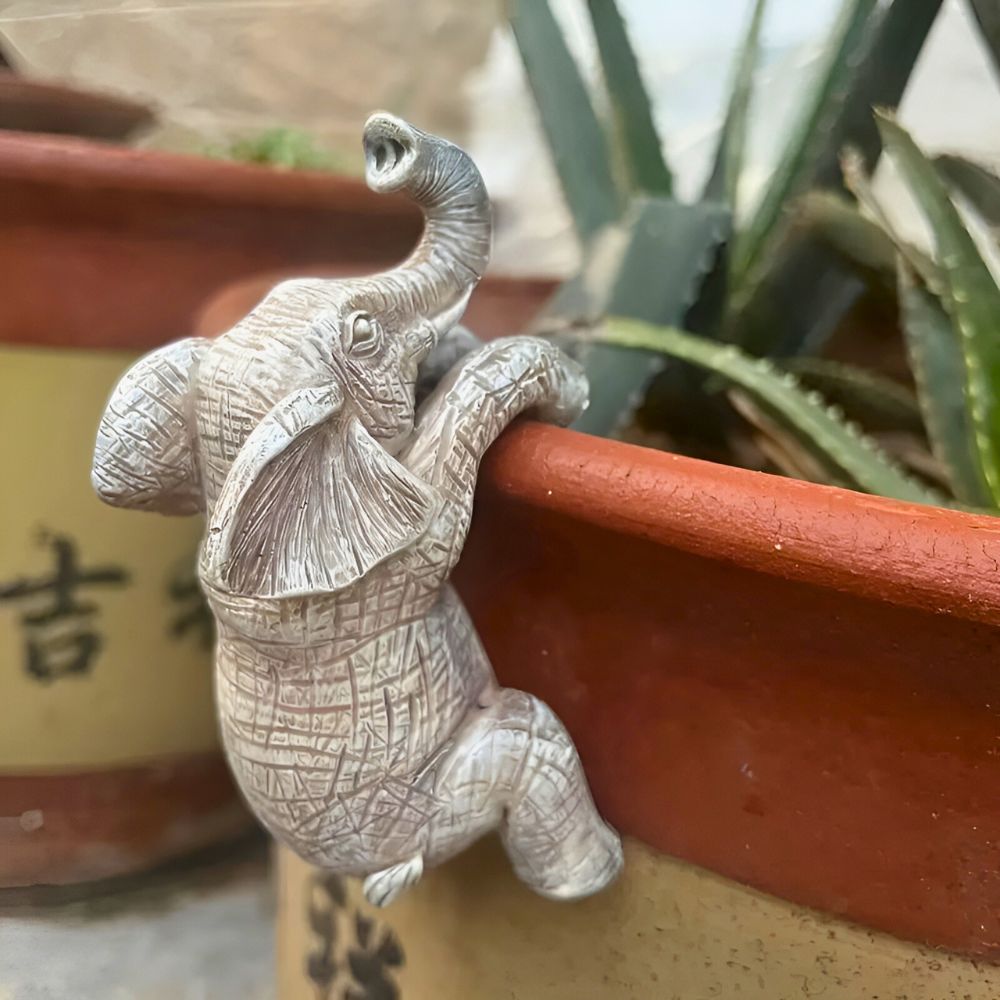 Unique Elephant Climbing Sculpture