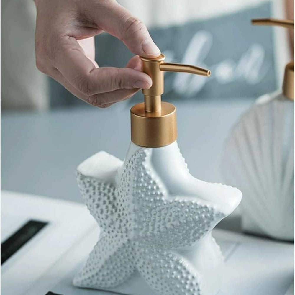Dispensador de jabón cerámico con conchas marinas