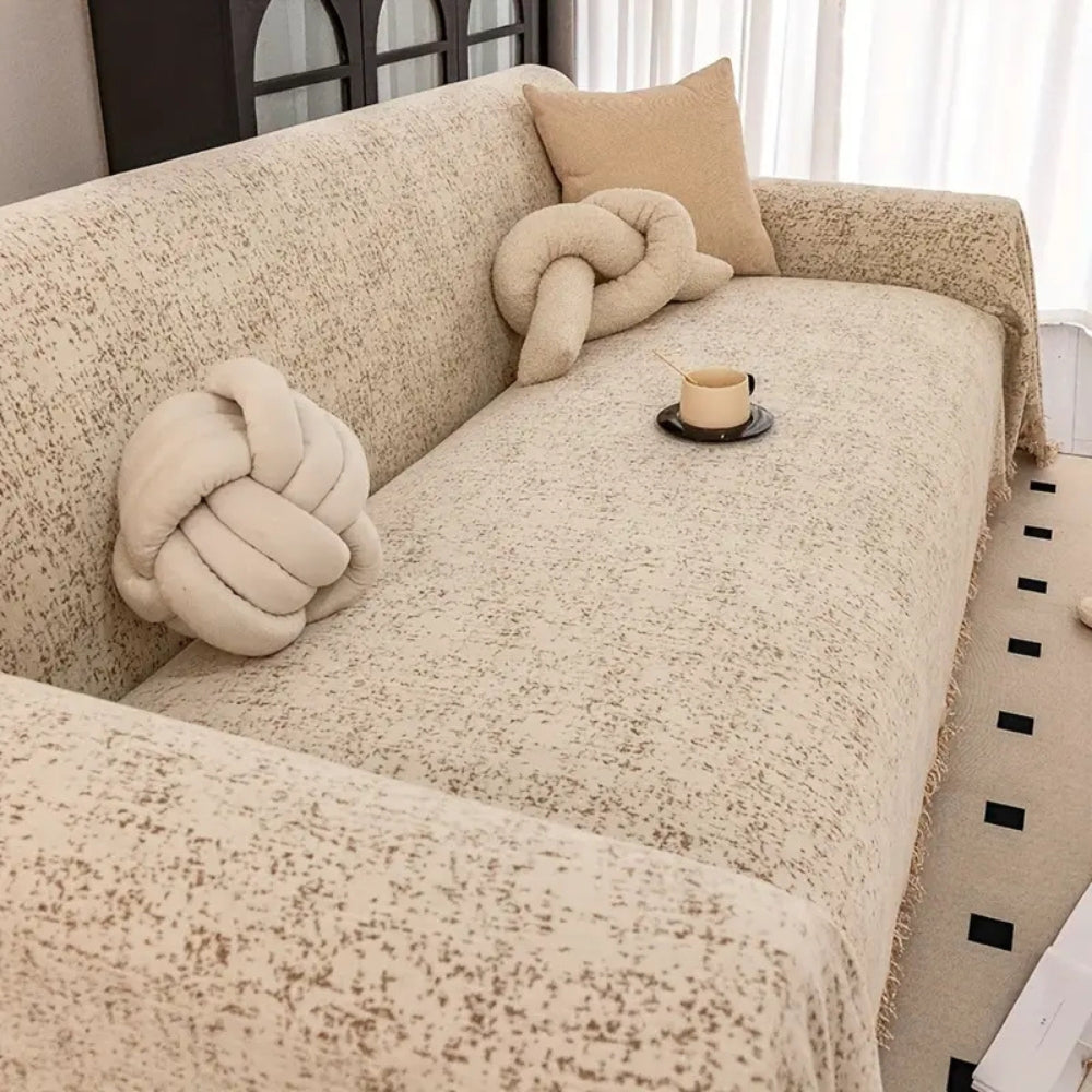 Funda de sofá de chenilla con patrón moteado
