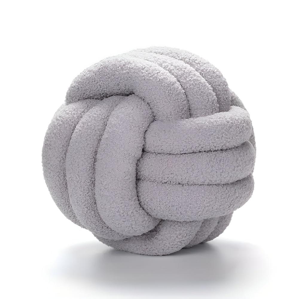 Geknotetes Bouclé-Kissen
