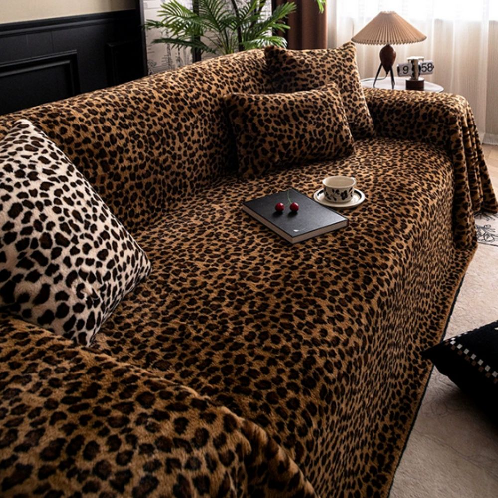Funda de sofá acogedora con estampado de leopardo